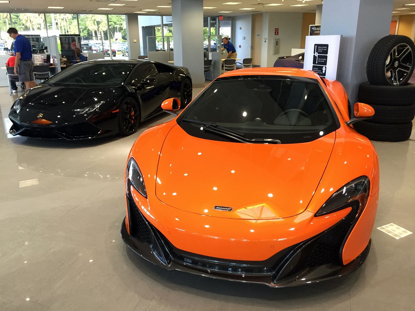 Black Lamborghini and Orange McLaren