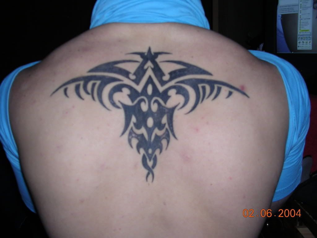 tattoo gueixa nas costas