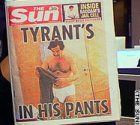 Saddam in shorts