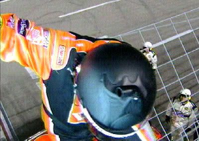 Tony Stewart climbs to fence after winning at Phoenix