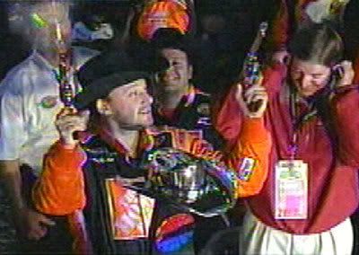 Tony Stewart shoots guns in the air after winning at Phoenix