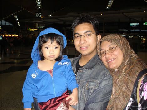 Hana, me and mama at the airport
