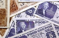 a pile of old food stamp coupons