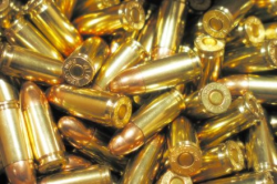 image showing pile of gun ammunition