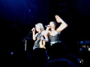 image of Andrea singing next to Sharon
