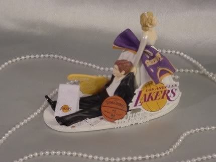Yes that is a Laker wedding cake topper You can go get it here