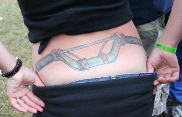 http://i18.photobucket.com/albums/b132/Cbretr2/handlebar-tattoo.jpg