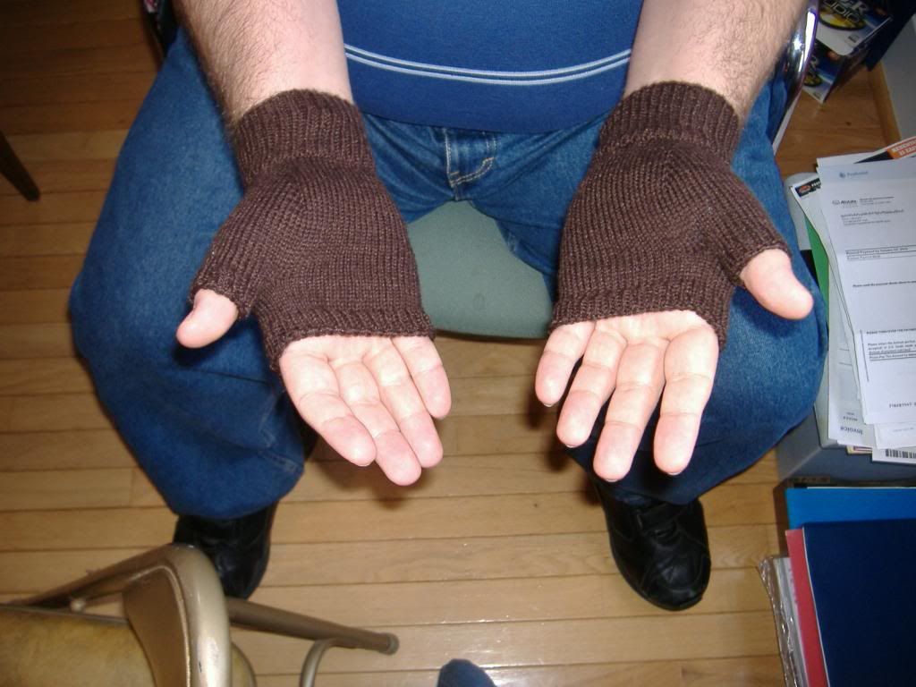 mitts being worn, palm up