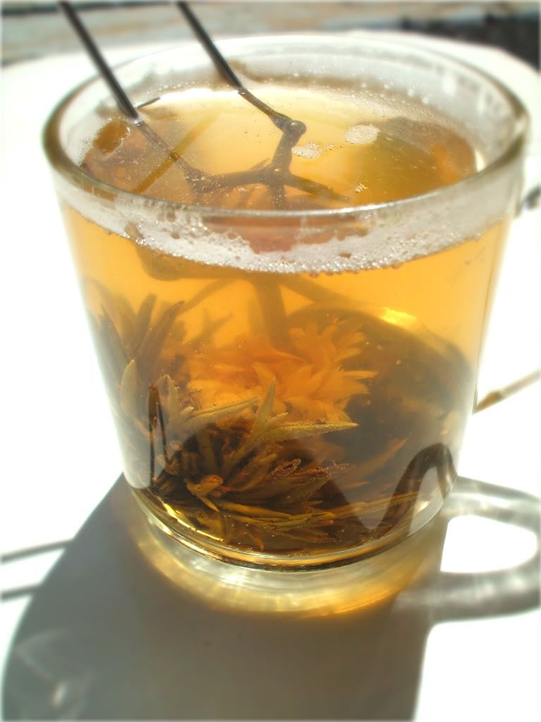 mam gavethat flowering tea in glass mug