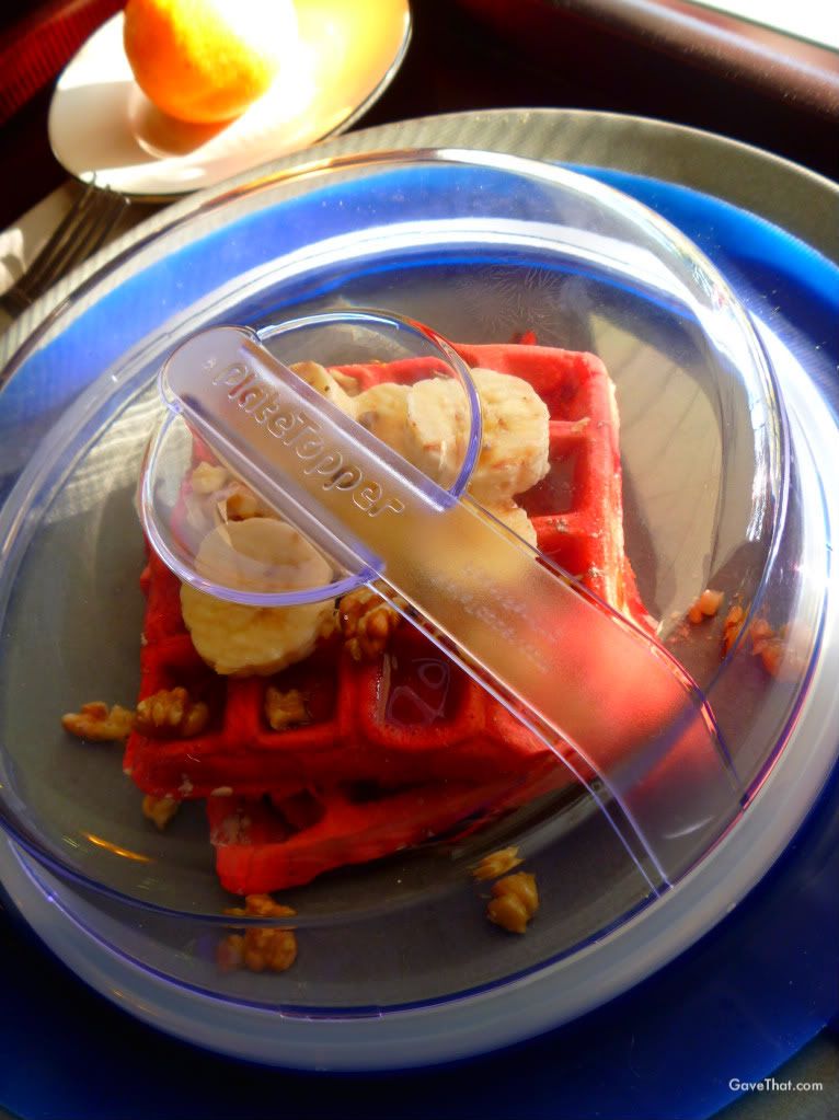 Red Velvet Belgium waffles orange on tray topped by the PlateTopper for guests