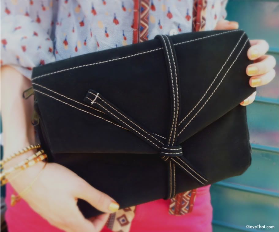 magda for gift blog gave that marie holding the Hold Me bag in classic black