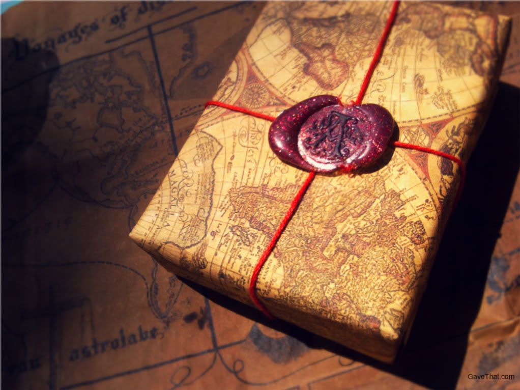 Old Mab wrapped gift with red wax seal