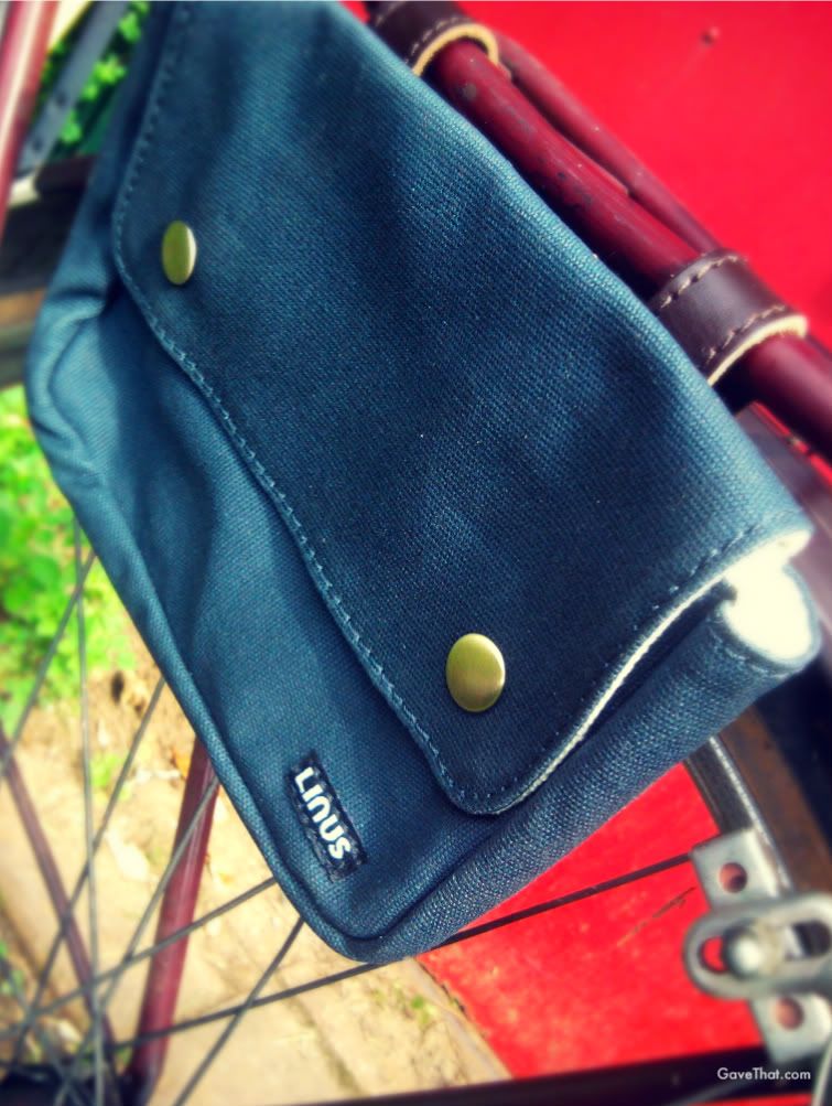 Linus pouch bag on my vintage bicycles book rack