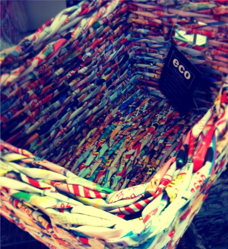 Recycled magazine pages stacking woven baskets