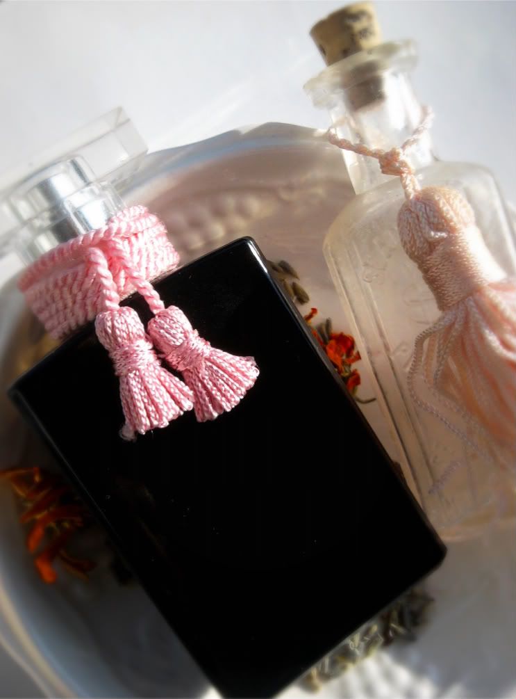 Soap Glory perfume and antique pharmacy bottles with pink tassels