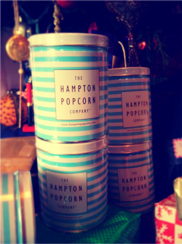 Tins with blue and white stripes from The Hampton Popcorn Company
