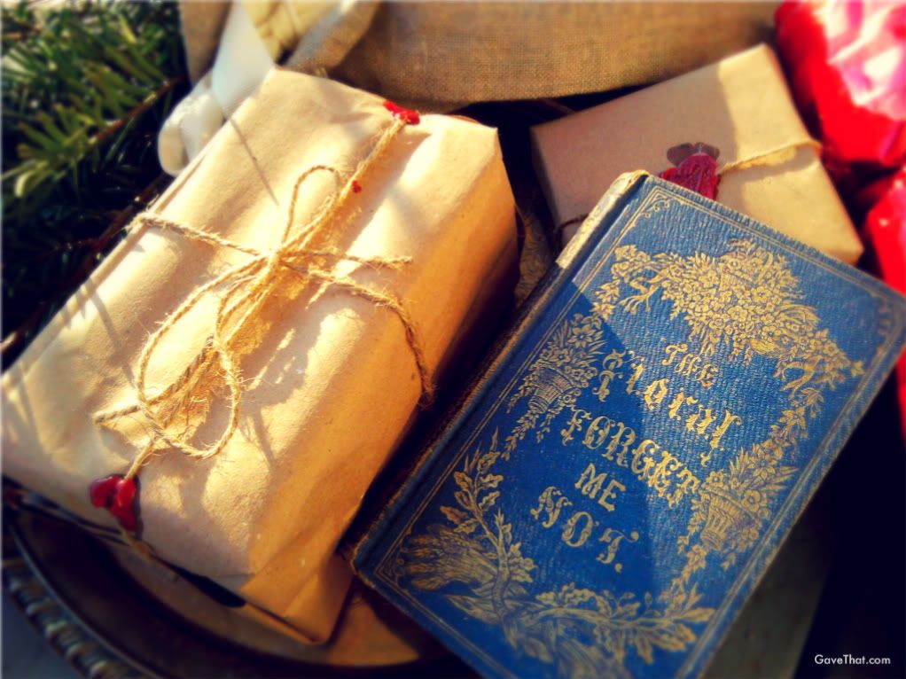 Presents wrapped in brown paper red wax seals and twine