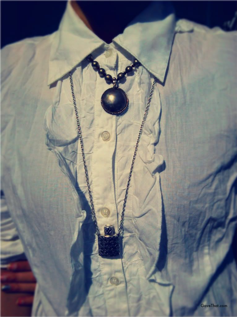 Me wearing the JewelMint Persephone necklace with an older Windy Mink necklace with a white collared broomstick shirt