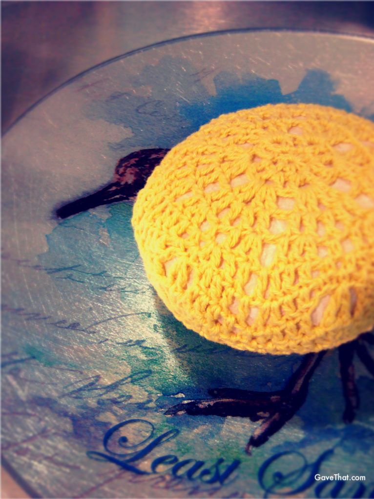 Yellow crocheted Castile gift soap on beachy plate