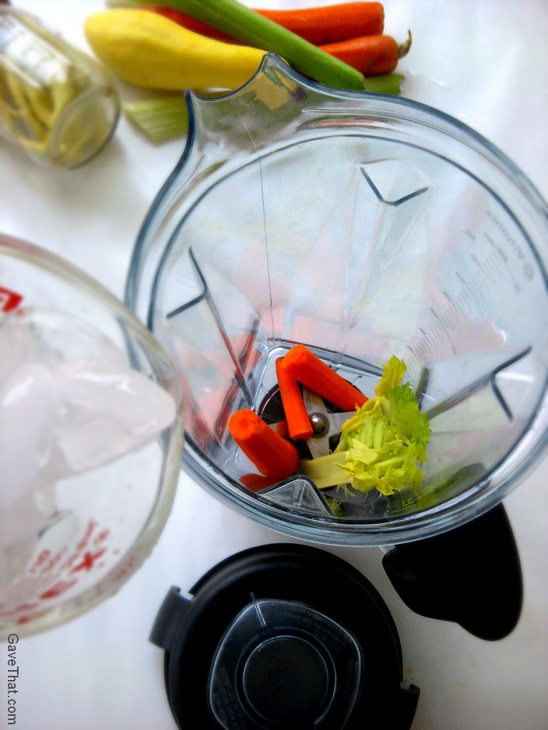 Putting fresh produce in the Vitamix to juice