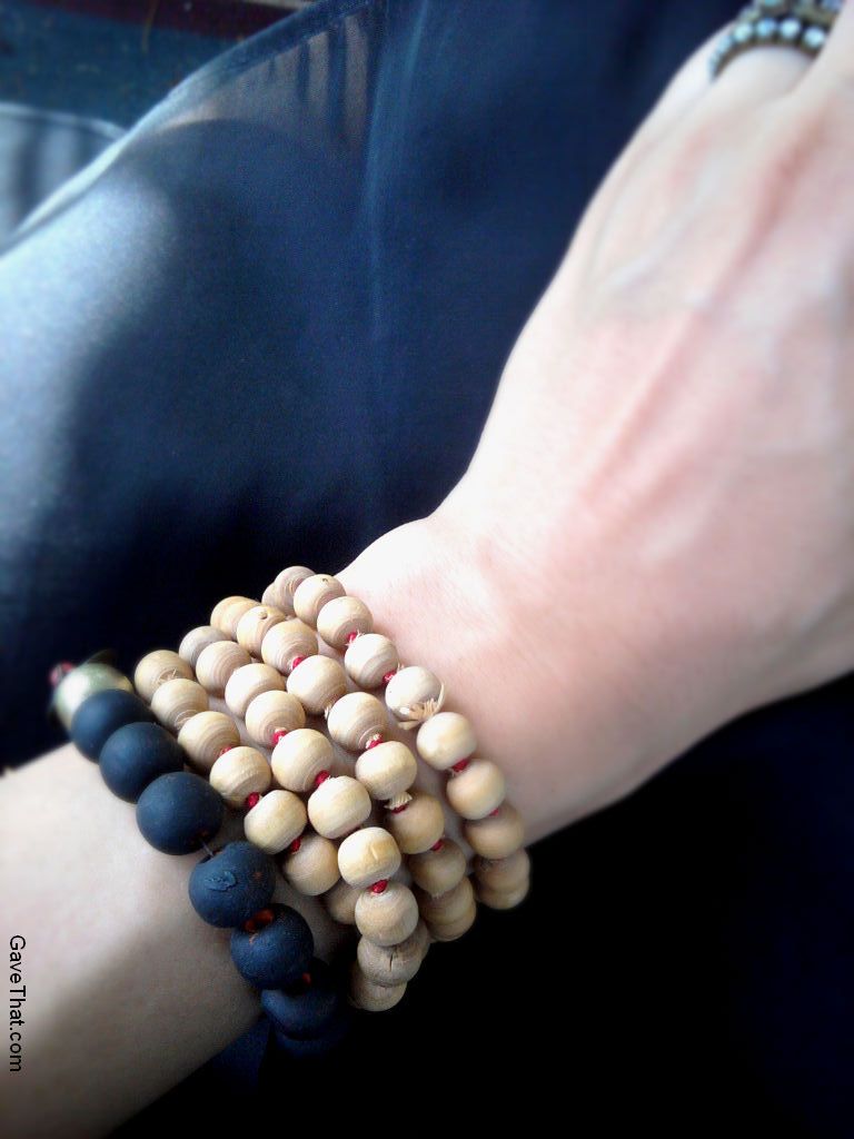 Wearing DIY handmade perfumed wooden beaded bracelets for Summer
