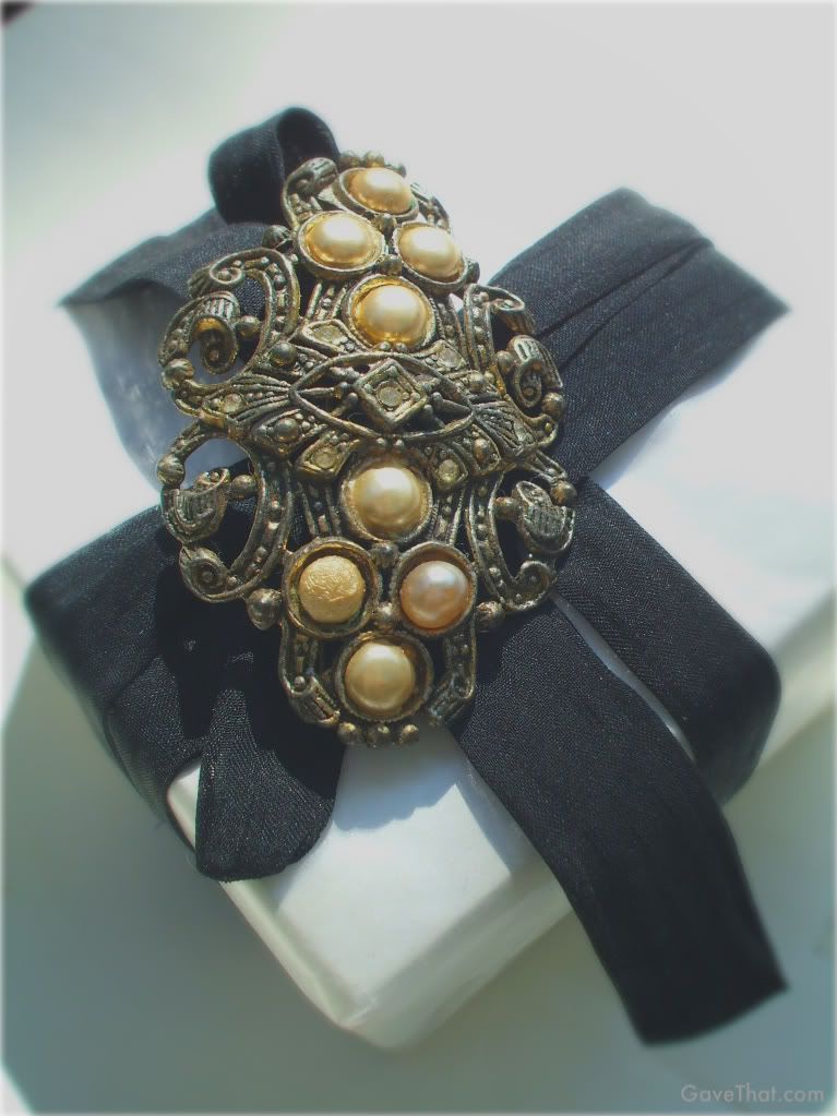 mam for gavethat white gift box wrapped in black silk ribbon and vintage pin