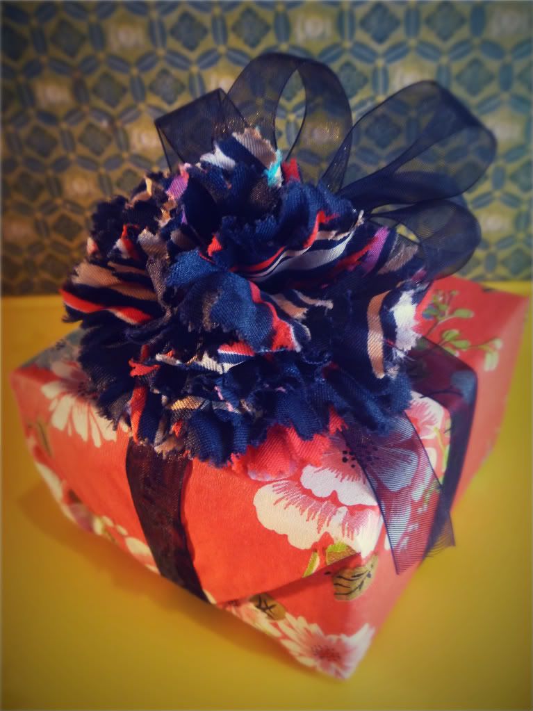 gave that vintage floral tissue paper wrapped gift with fabric chrysanthemums