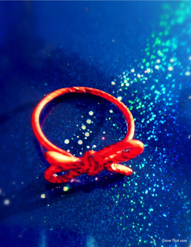 Limited edition red Forget Me Knot ring by Kiel Mead
