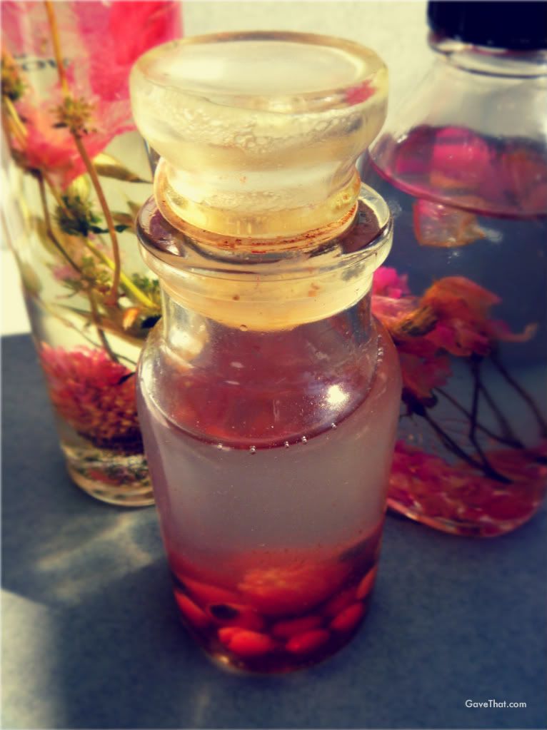 Rose hip oil bottled up with other floral oils