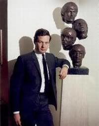 Brian Epstein with sculpture of The Beatles