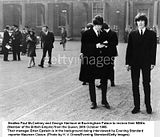Brian Epstein & Maureen Cleave in background at Buckingham Palace grounds. Paul and George in foreground.
