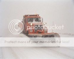 action shot of a snow plow