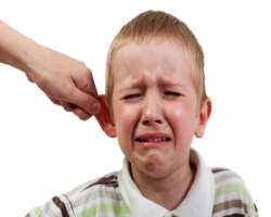 image of kid getting ear tweaked