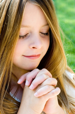 image of a young girl praying from freeimages.com